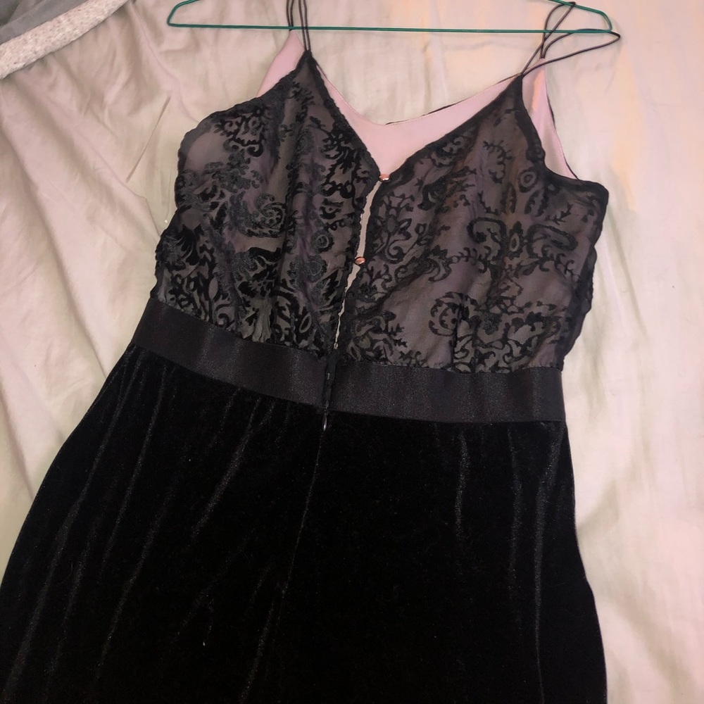 Black velvet dress with design